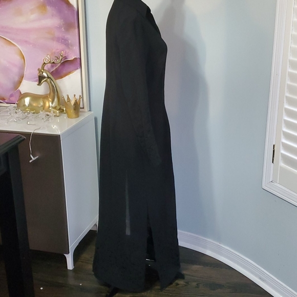 Full length black lightweight overcoat. - Picture 3 of 7